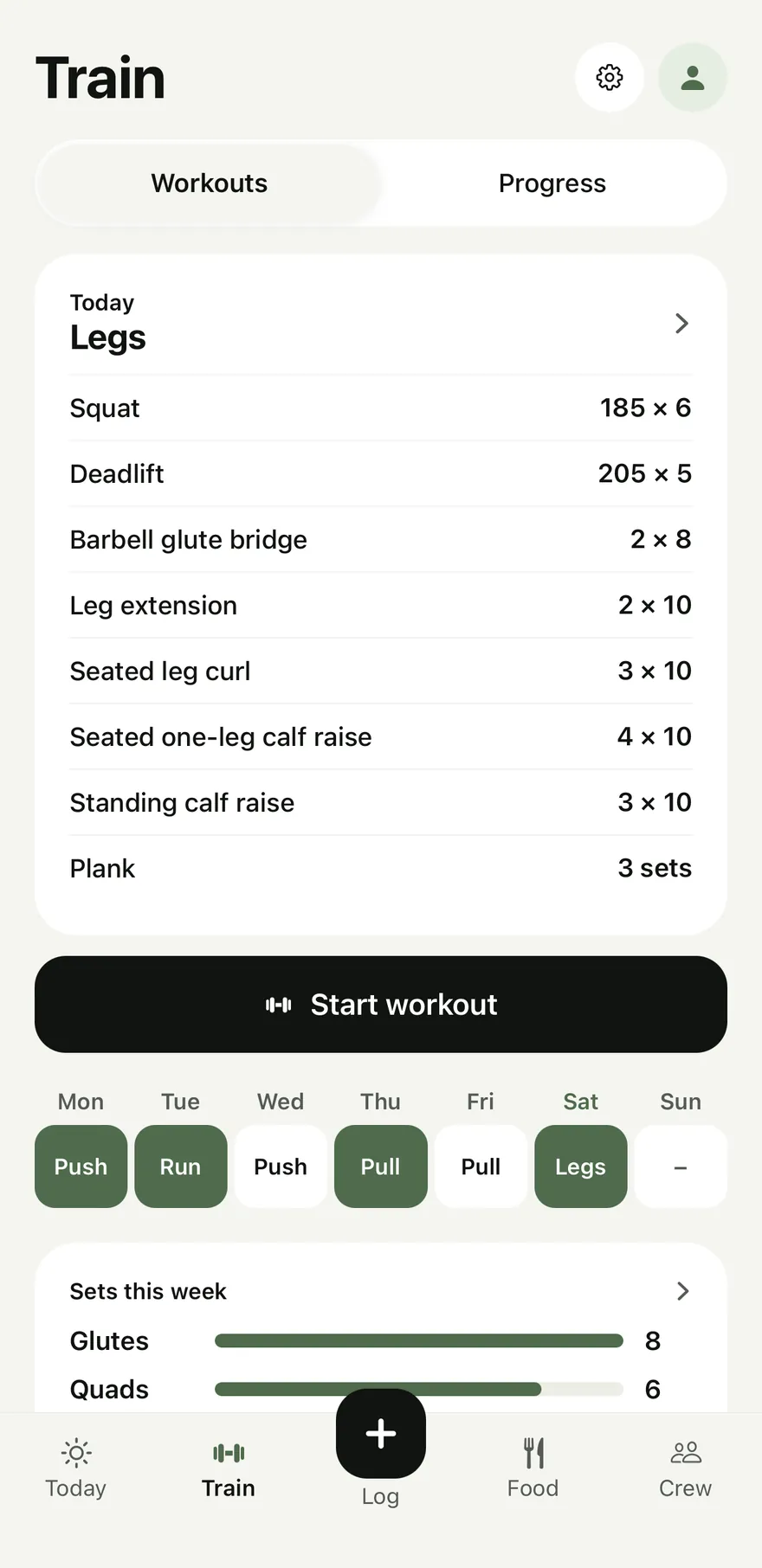 The Train screen: today is Legs, with the weight and reps from last time beside each exercise, a Start workout button and the week's split